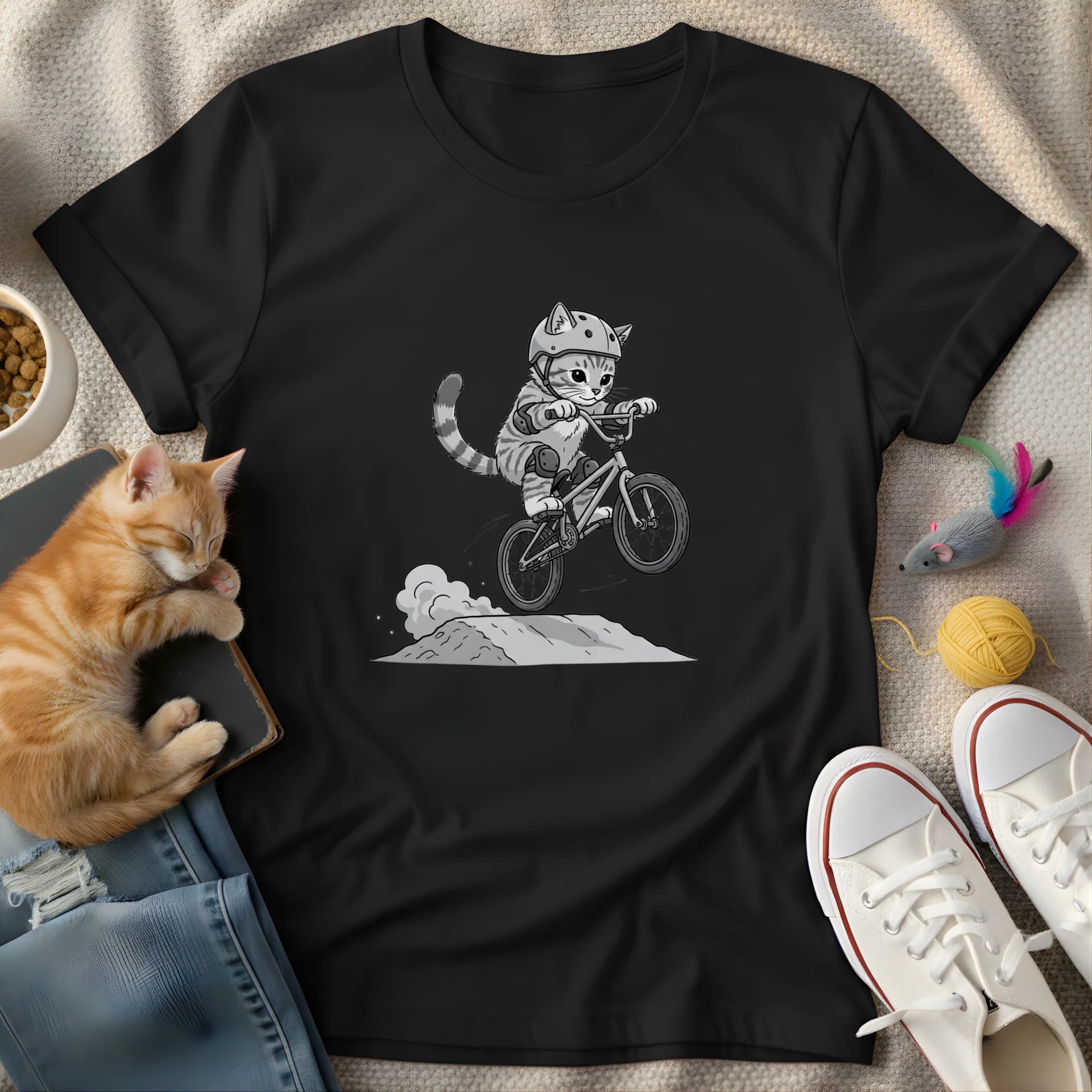 young cat riding bike grayscale - Graphic T-Shirt
